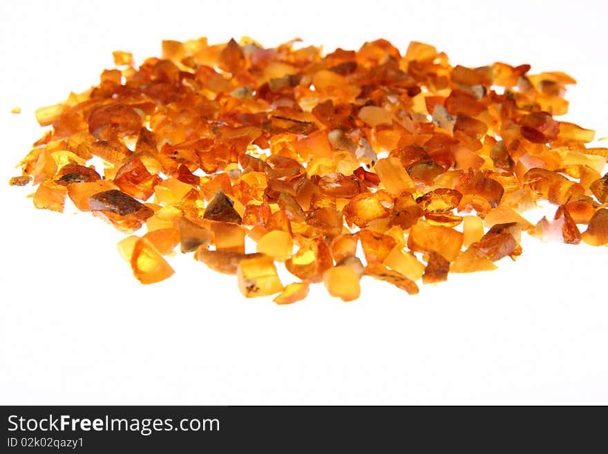 Stones of amber on white background. Stones of amber on white background