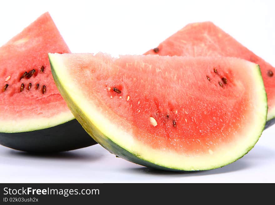 Pieces of watermelon on white background