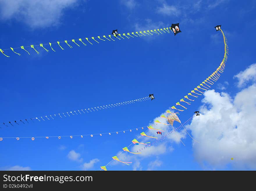 Kites flying in the blue sky. Kites flying in the blue sky