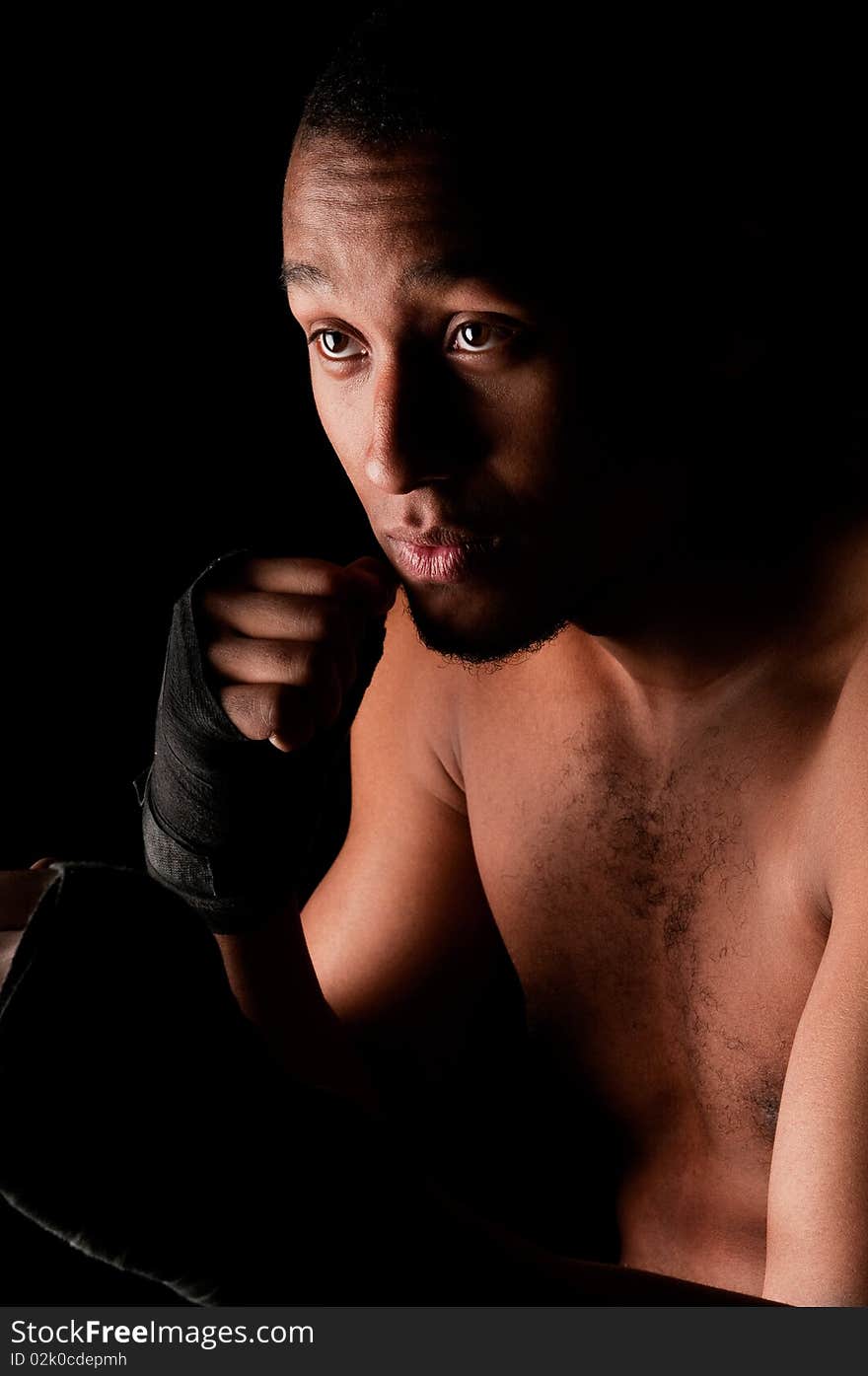 Young fighter male holding guard. Young fighter male holding guard