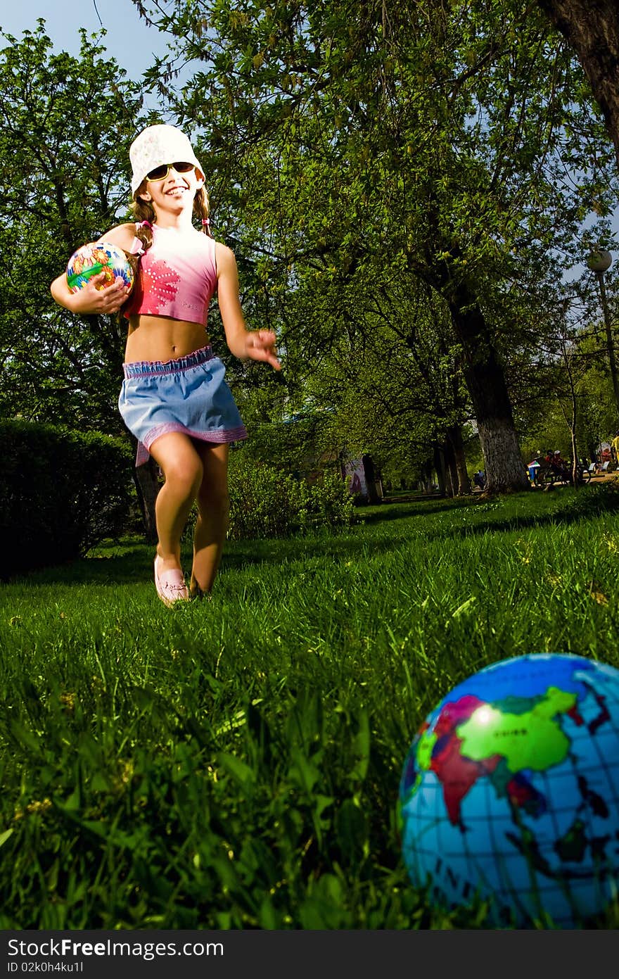 Girl with ball in park