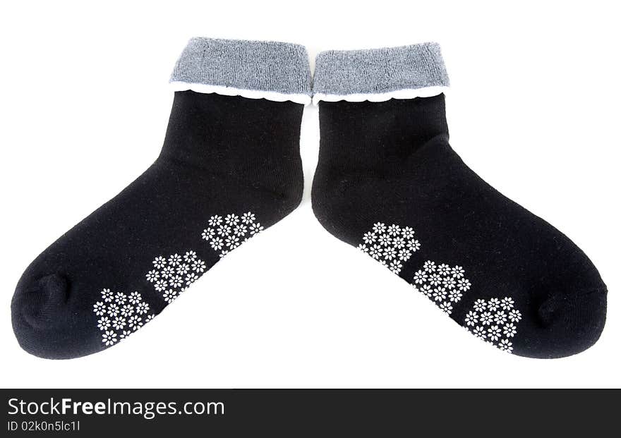 Pair warm sock with pattern in the manner of colour on white background