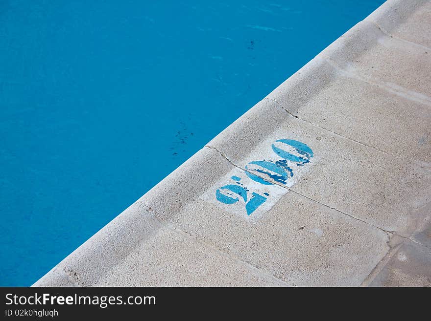 Sign indicating the depth of the swimming pool. Sign indicating the depth of the swimming pool