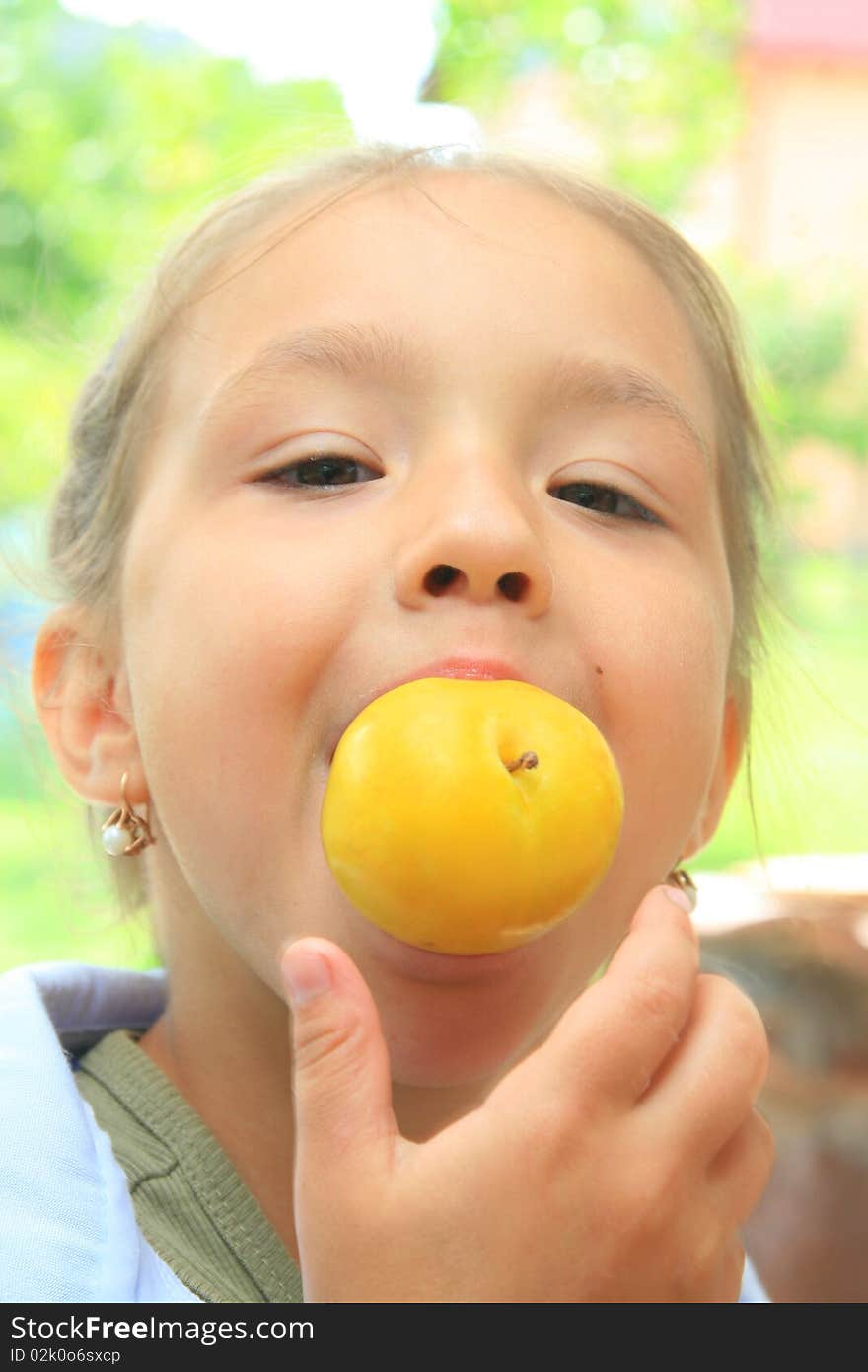 Young girl with an apple