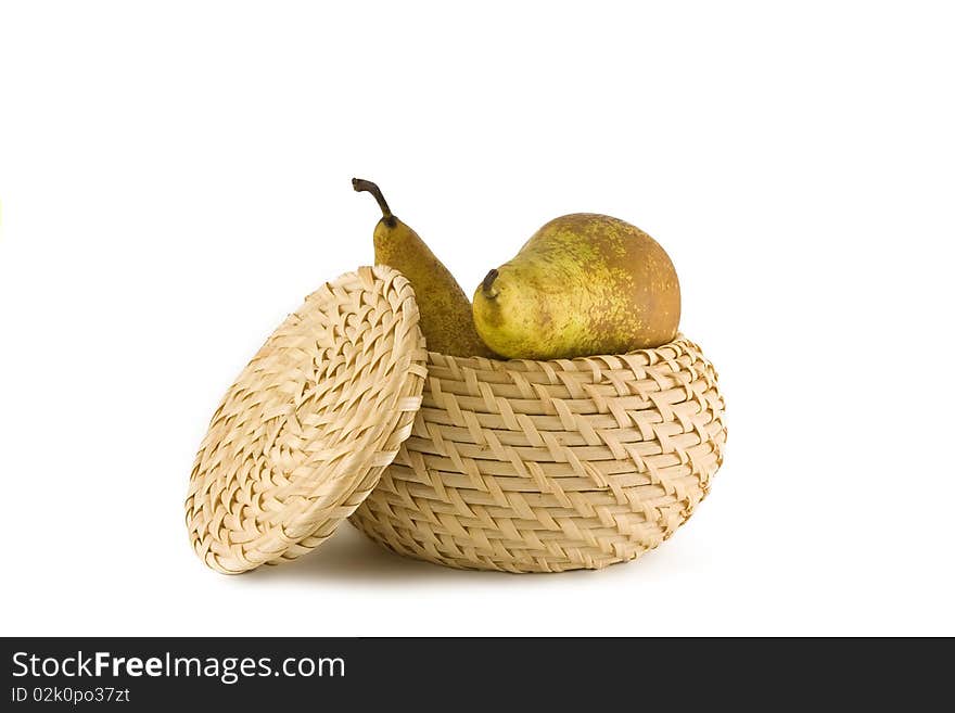 Two Green Pears In A Straw Basket