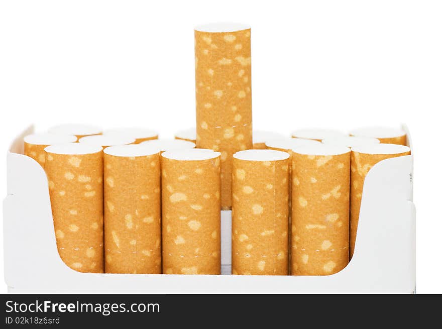 Pack of cigarettes with cigarettes sticking out close up