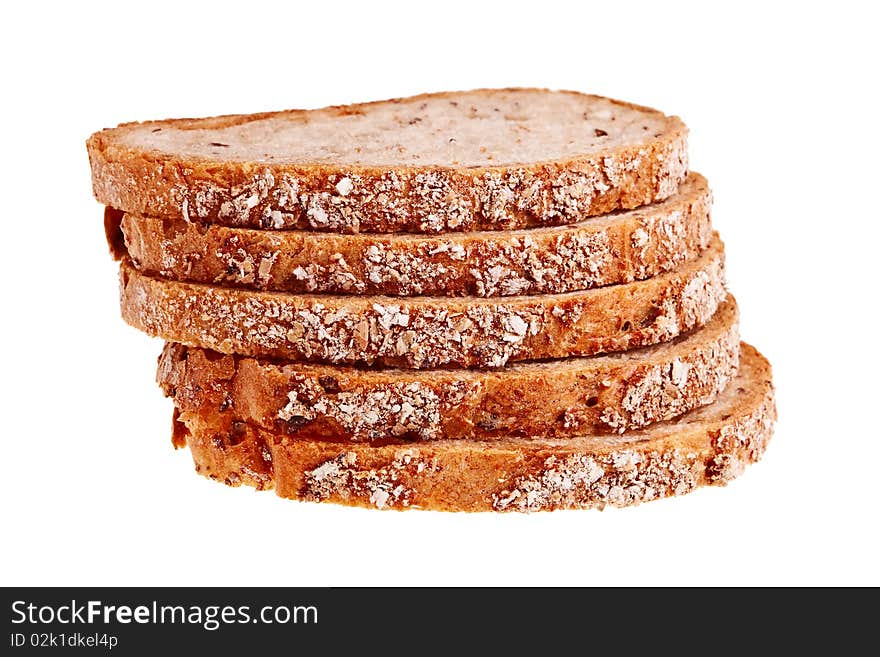 Five slices of wheat bread stacked isolated over white background. Five slices of wheat bread stacked isolated over white background.