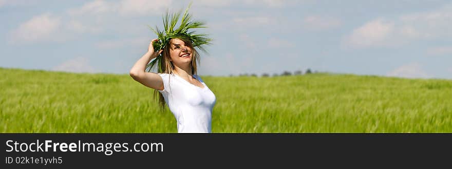 Young happy girl on natural background