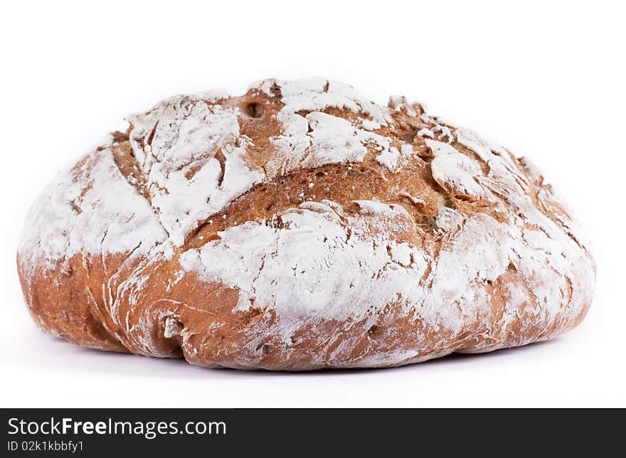 Homemade nut bread in front of white background