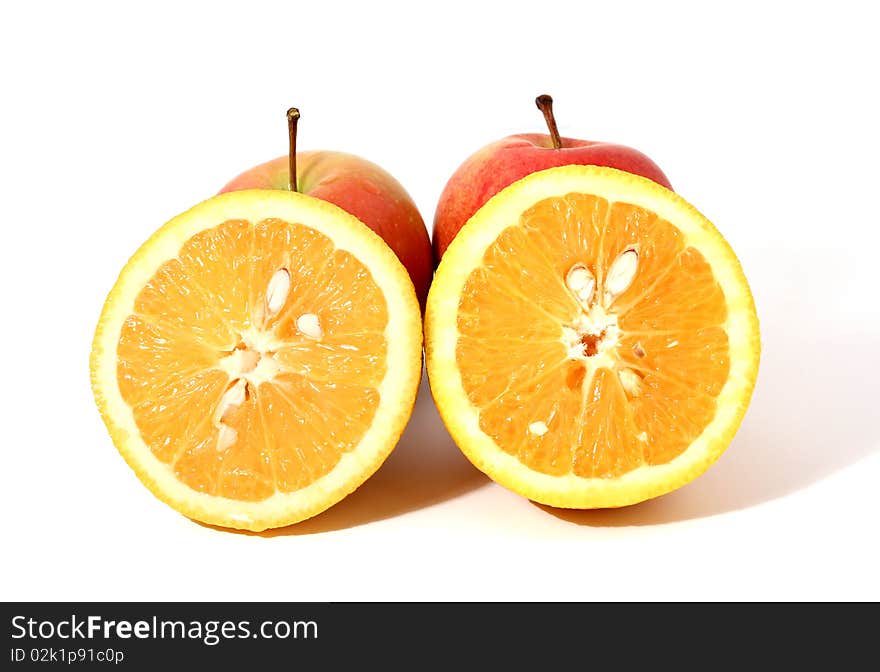 Two pieces of orange and two red apples with shadow isolated over white