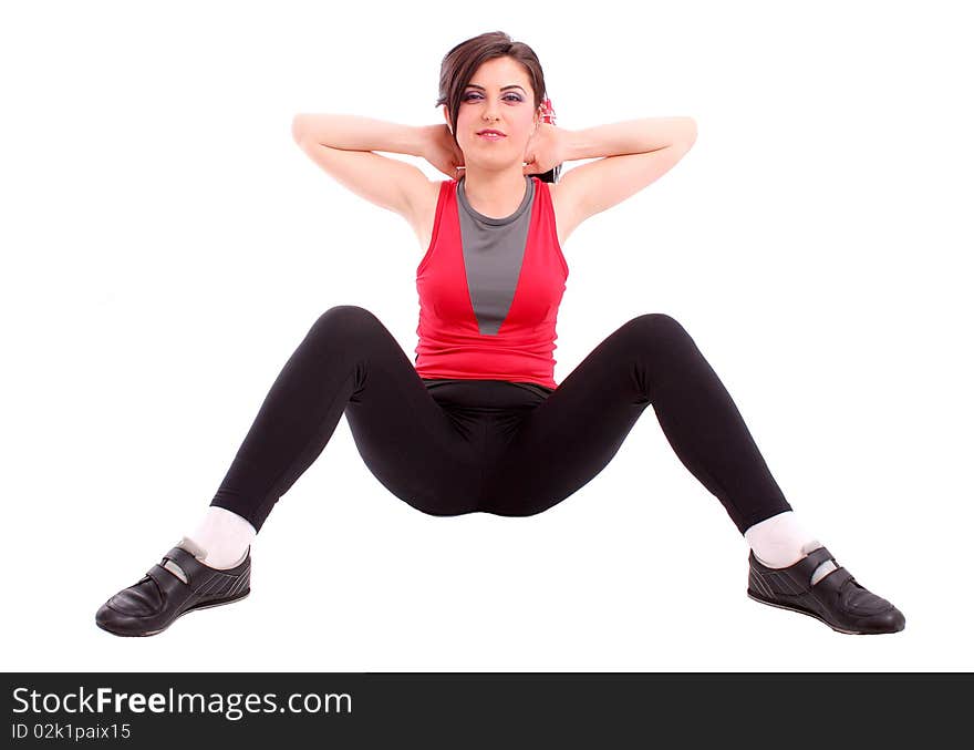 Pretty young girl in the gymnastic pose