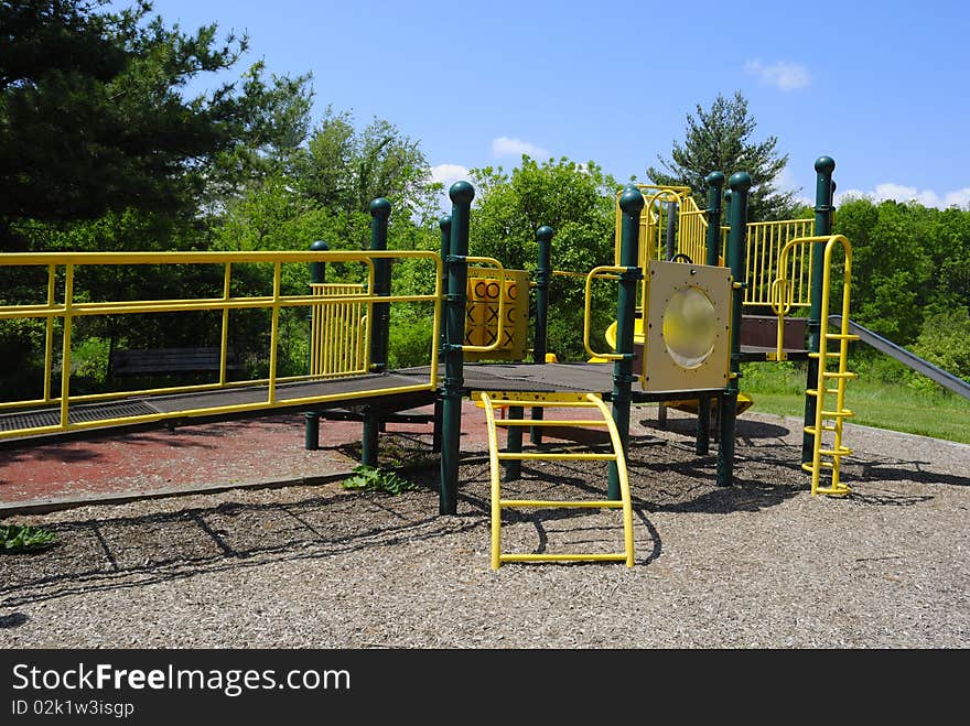 Yellow and green playground at the park