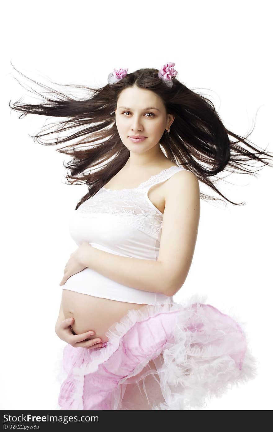 The image of a beautiful cute pregnant girl