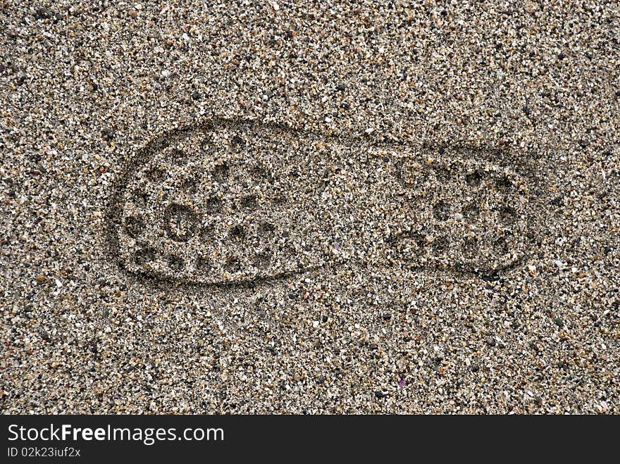 Single shoe imprint on sand