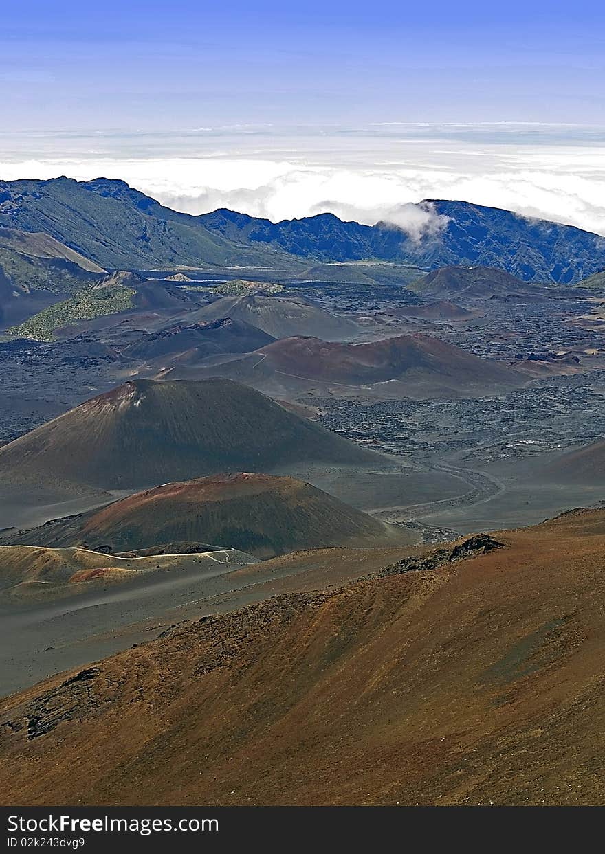 Clouds roll onto the summit of Haleakala volcano on Maui, Hawaii. Clouds roll onto the summit of Haleakala volcano on Maui, Hawaii