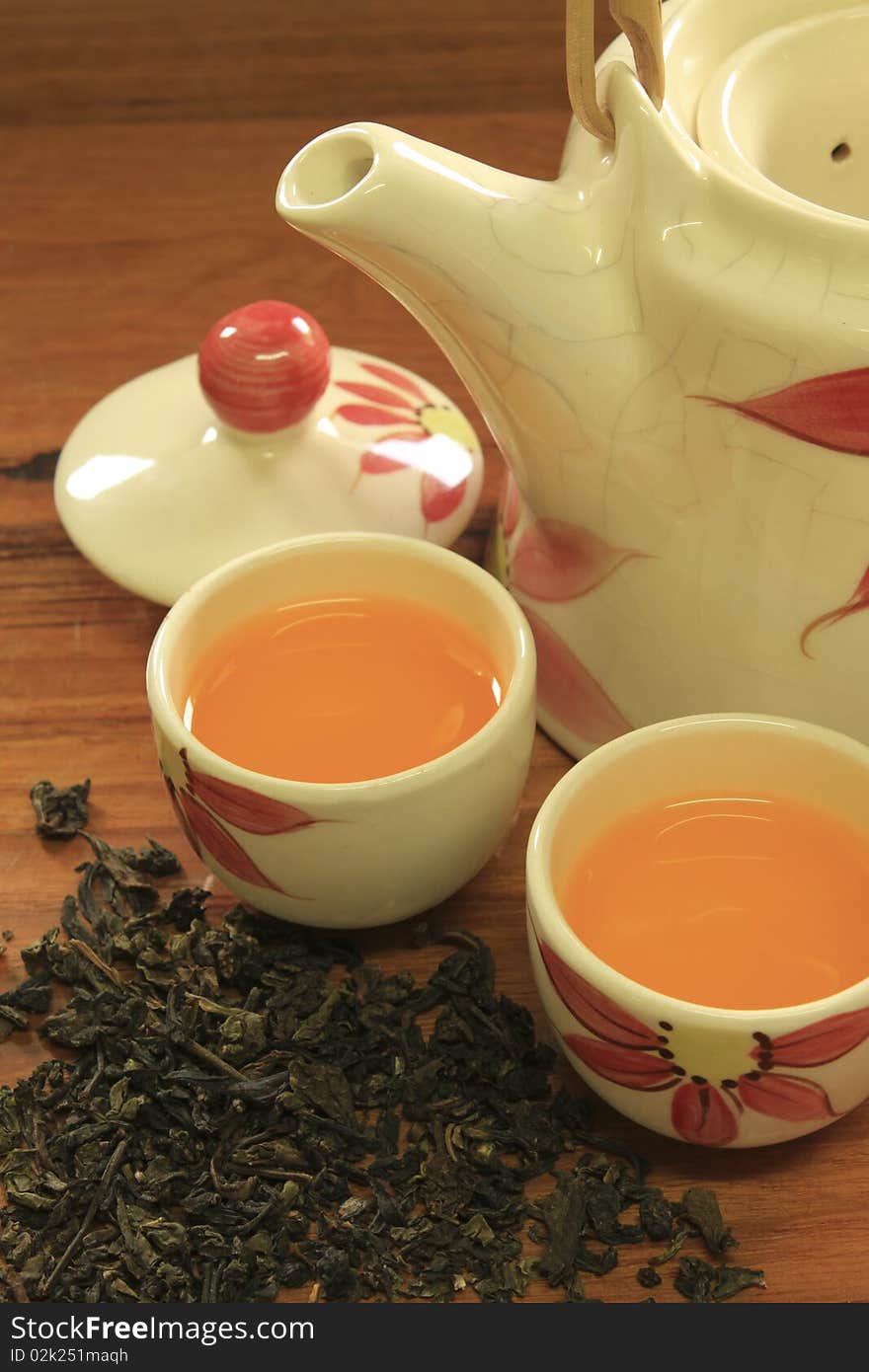 Chinese tea in ceramic pot on wood table