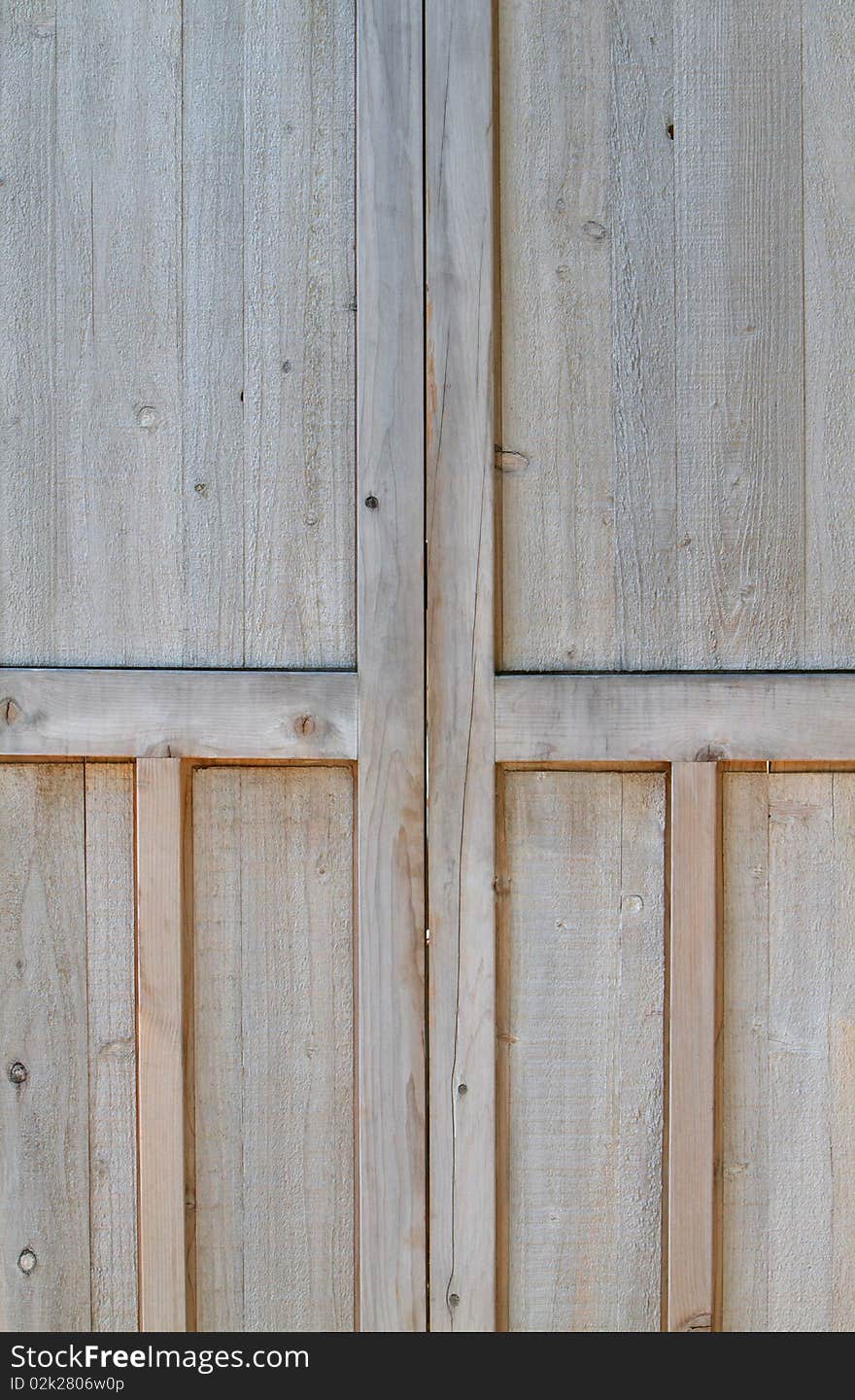 Partial Close-up two plain wood doors. Partial Close-up two plain wood doors