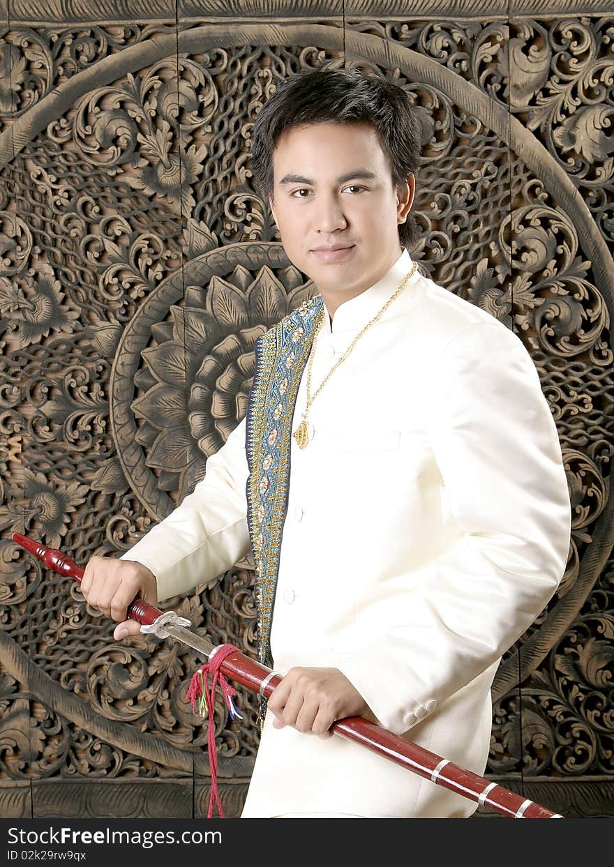 Asian thai man in silk dress