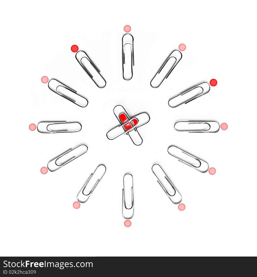 Heart in crosshair of the arrows of the dial from staples.