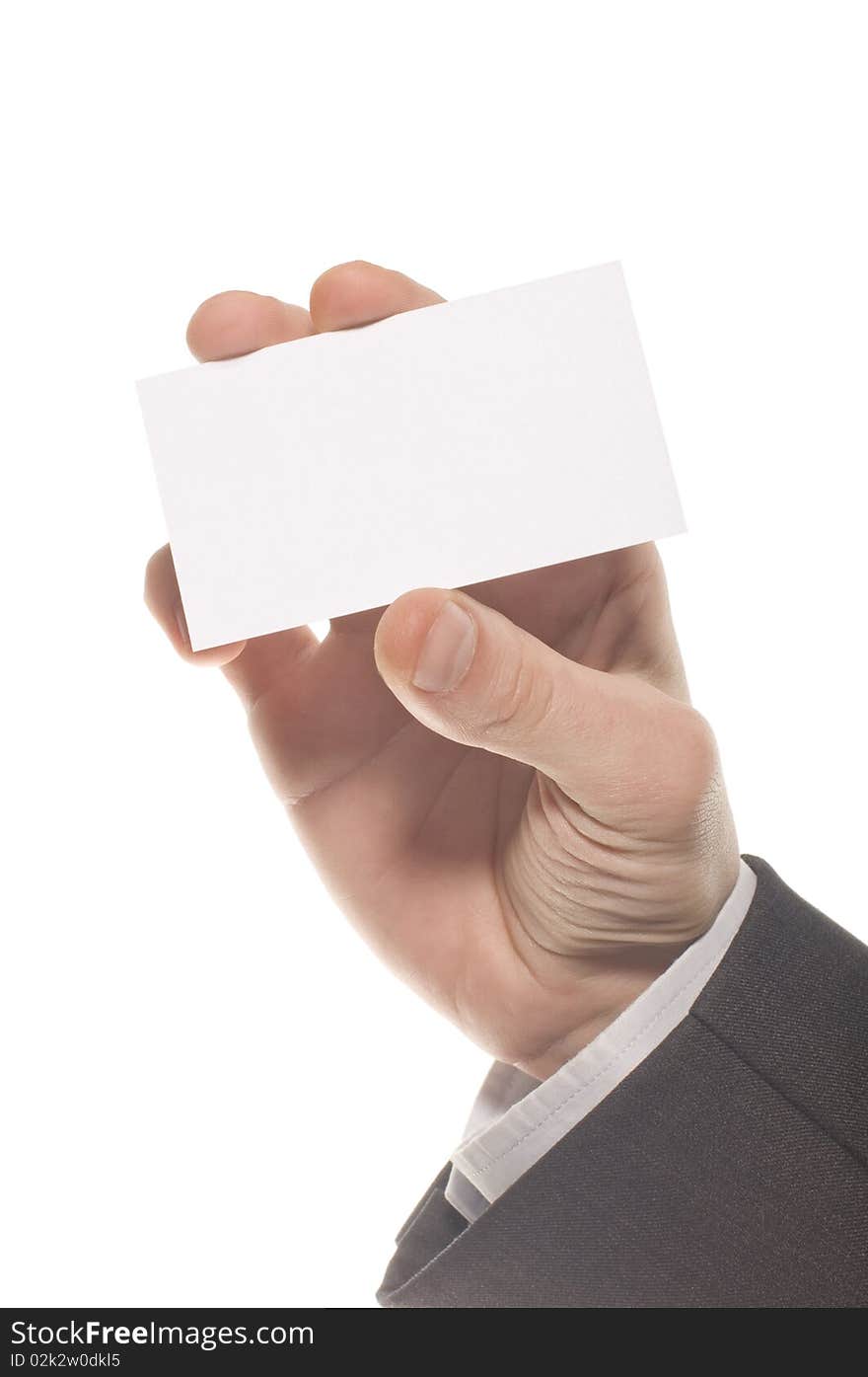 Hand holding an empty business card over white background