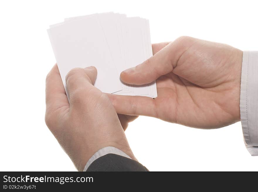 Hand holding an empty business card over white background