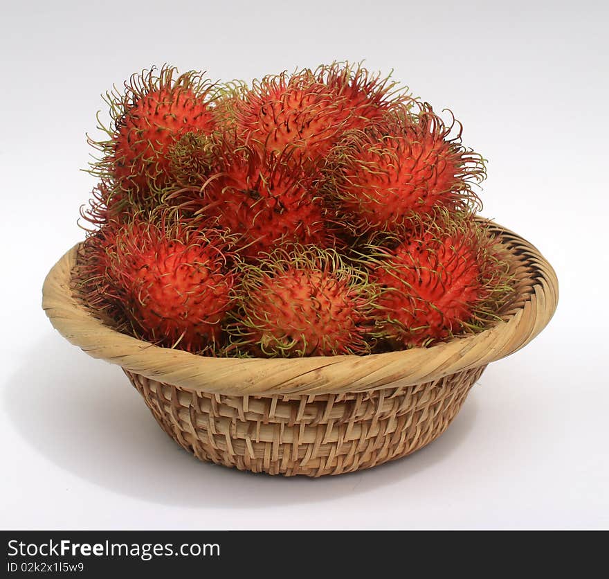 Tropical fruit rambutan with white background