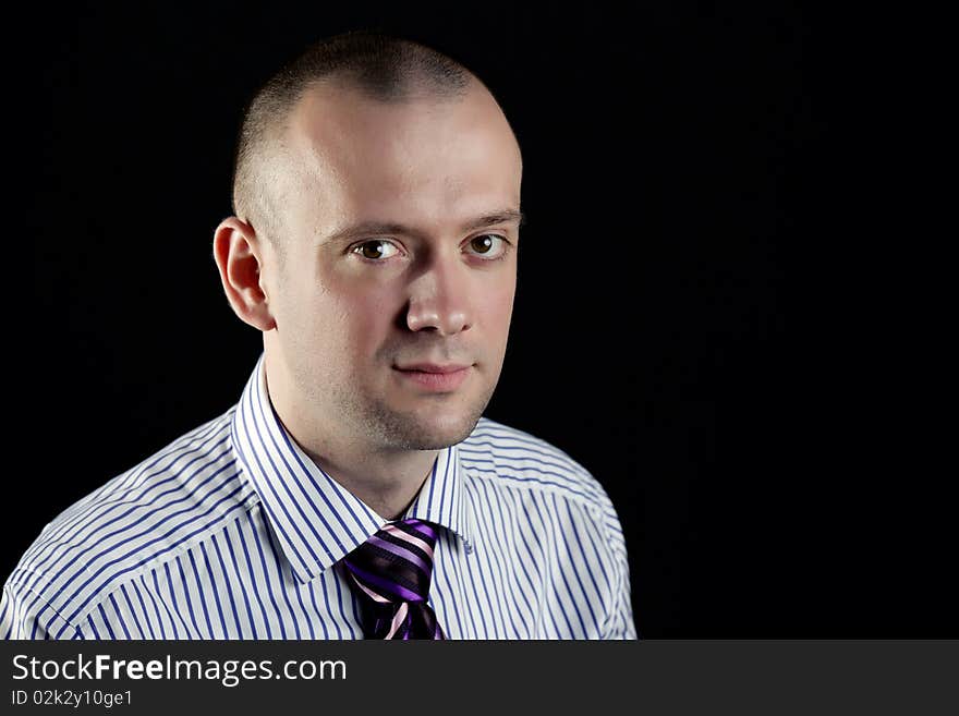 Portrait of businessman on a black background. Portrait of businessman on a black background