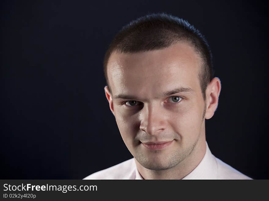 Portrait of businessman on a black background. Portrait of businessman on a black background