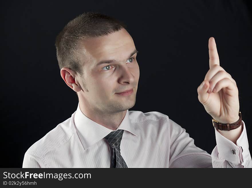 Portrait of businessman on a black background. Portrait of businessman on a black background