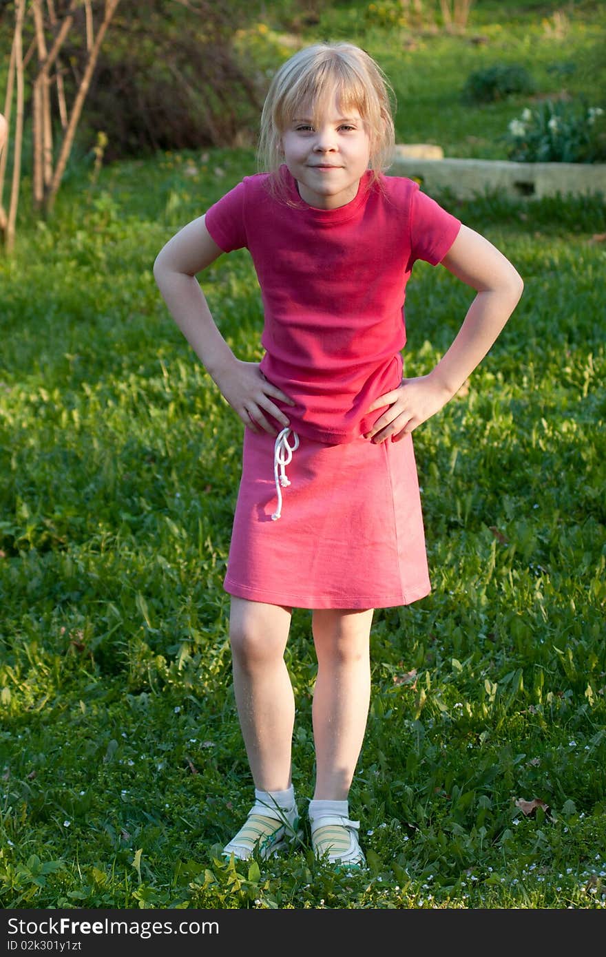 Girl poses in garden