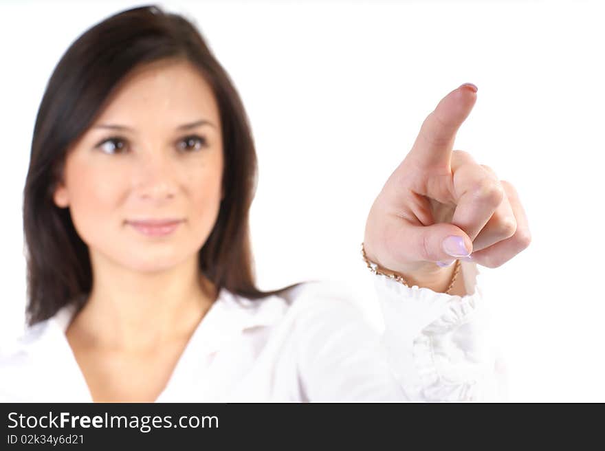 A young business woman is pointing at something