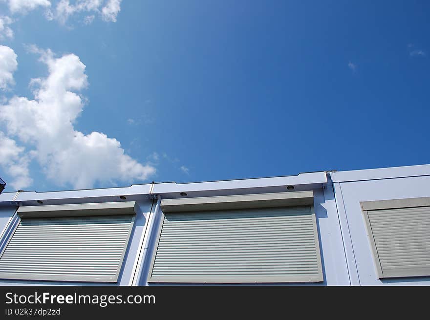 Top of a building with covers against the sun. Top of a building with covers against the sun