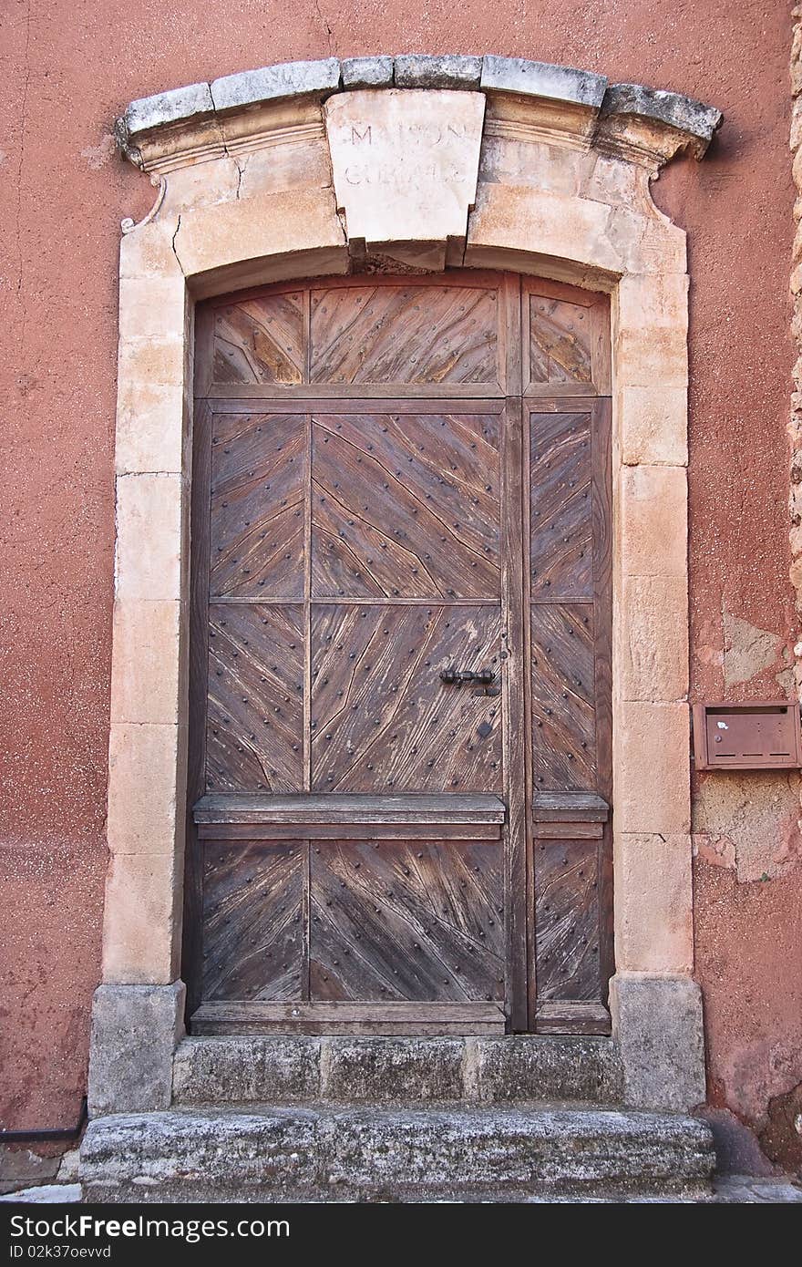 An old door in a typical French village in Provence