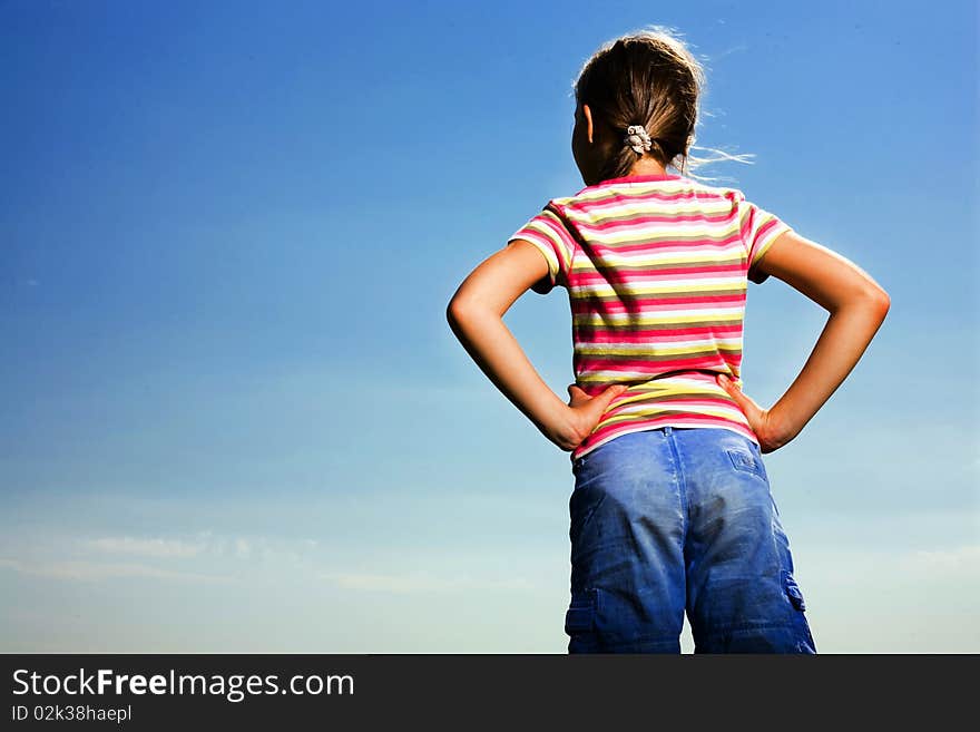 Girl On Background Of Sky