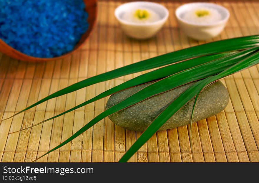 Stone, sea solt and candles for a spa treatment