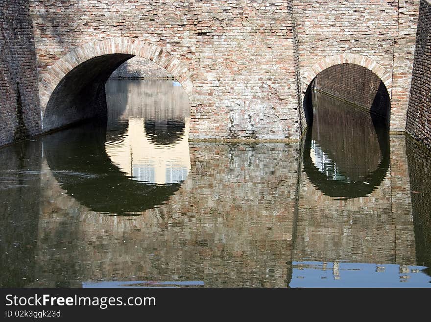 Stone bridge around a medieval castle. Stone bridge around a medieval castle