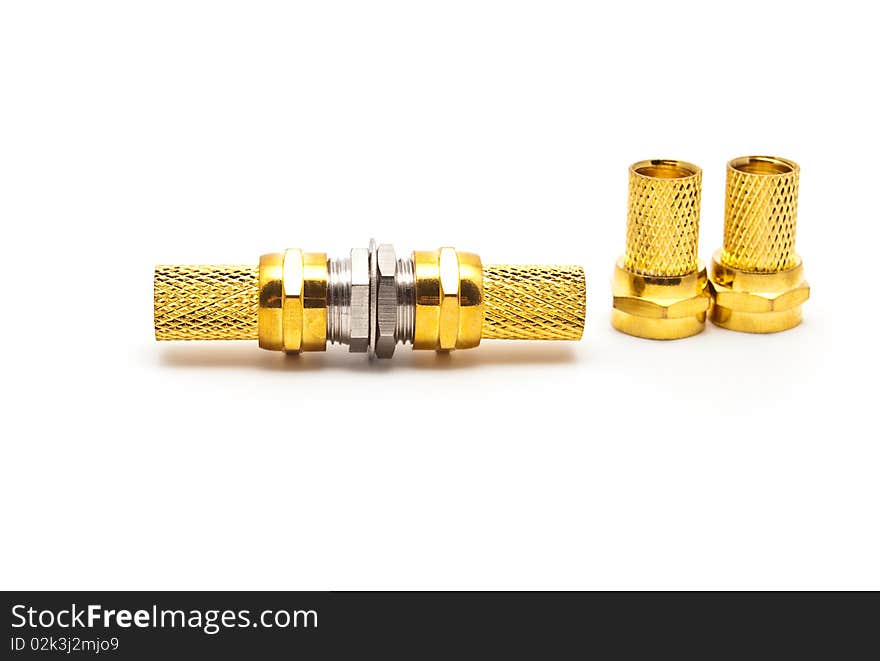 Gilded television connectors on a white background