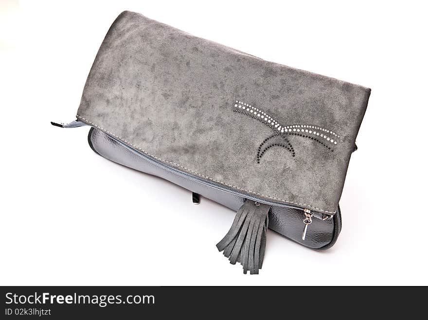 Leather grey handbag isolated on white background