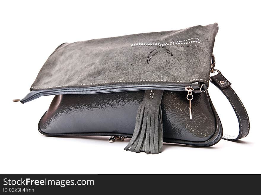 Leather grey handbag isolated on white background