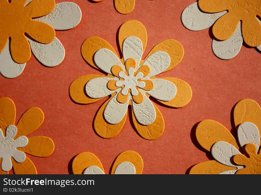 Colorful paper flower on brown background. Colorful paper flower on brown background