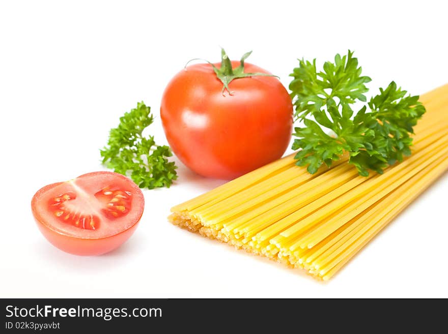 Tomatoes and pasta on a white background