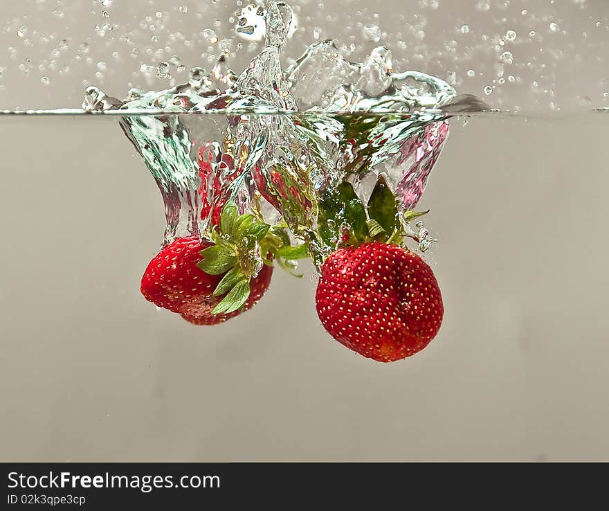 Fresh Strawberry splashing in Water. Fresh Strawberry splashing in Water