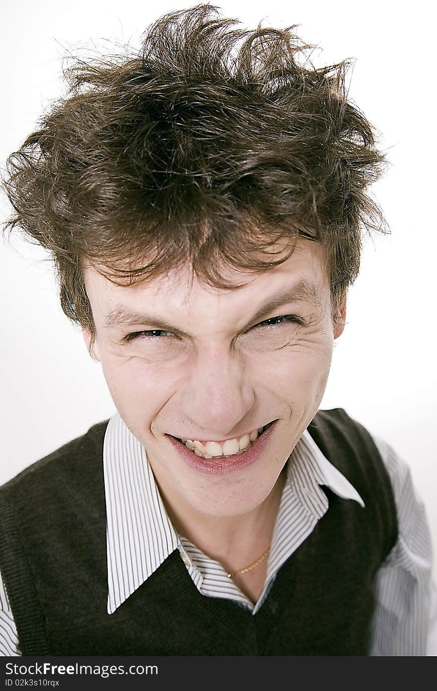 Portrait of young tousled man in studio. Portrait of young tousled man in studio