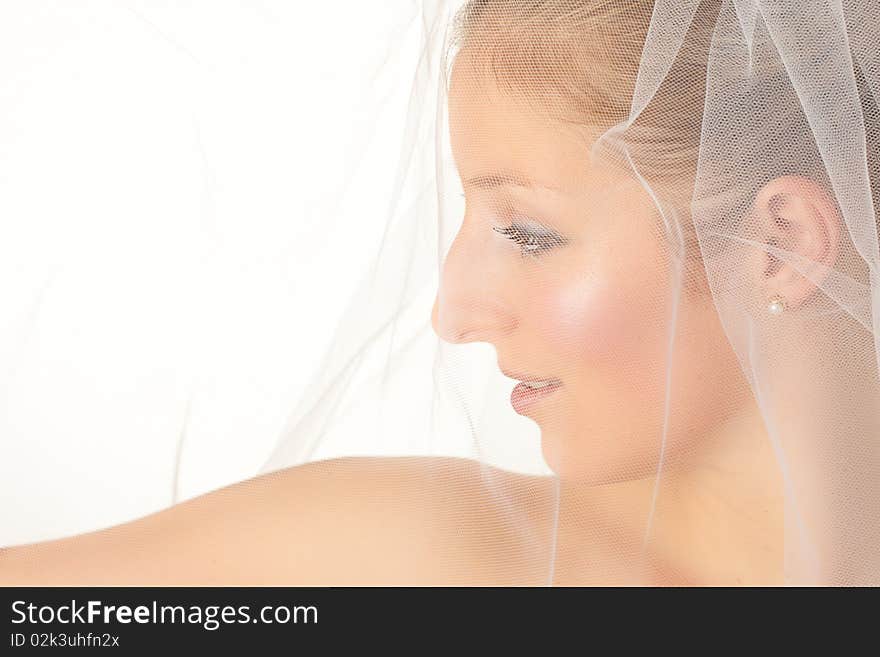 Young woman in wedding dress