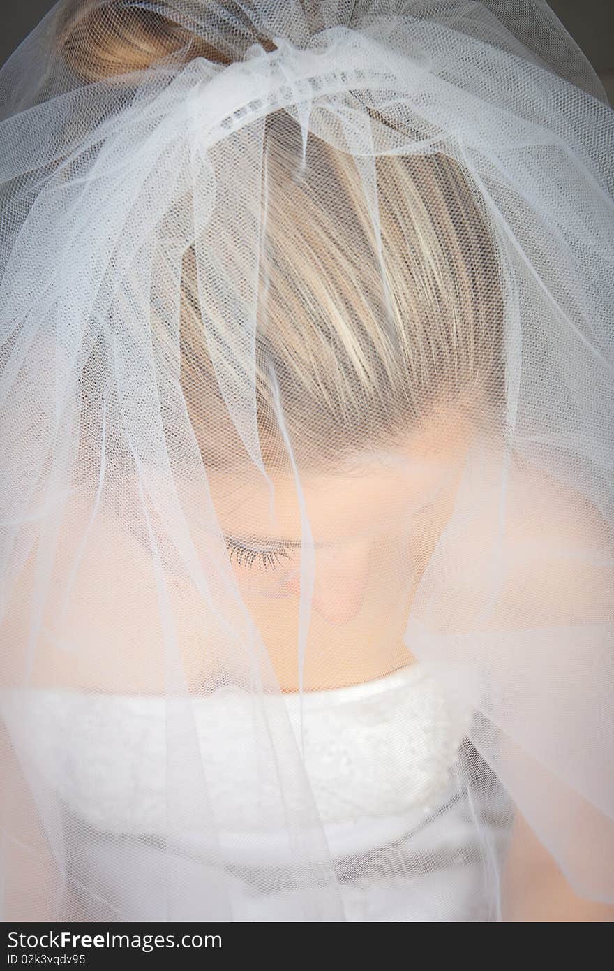 Young woman in wedding dress