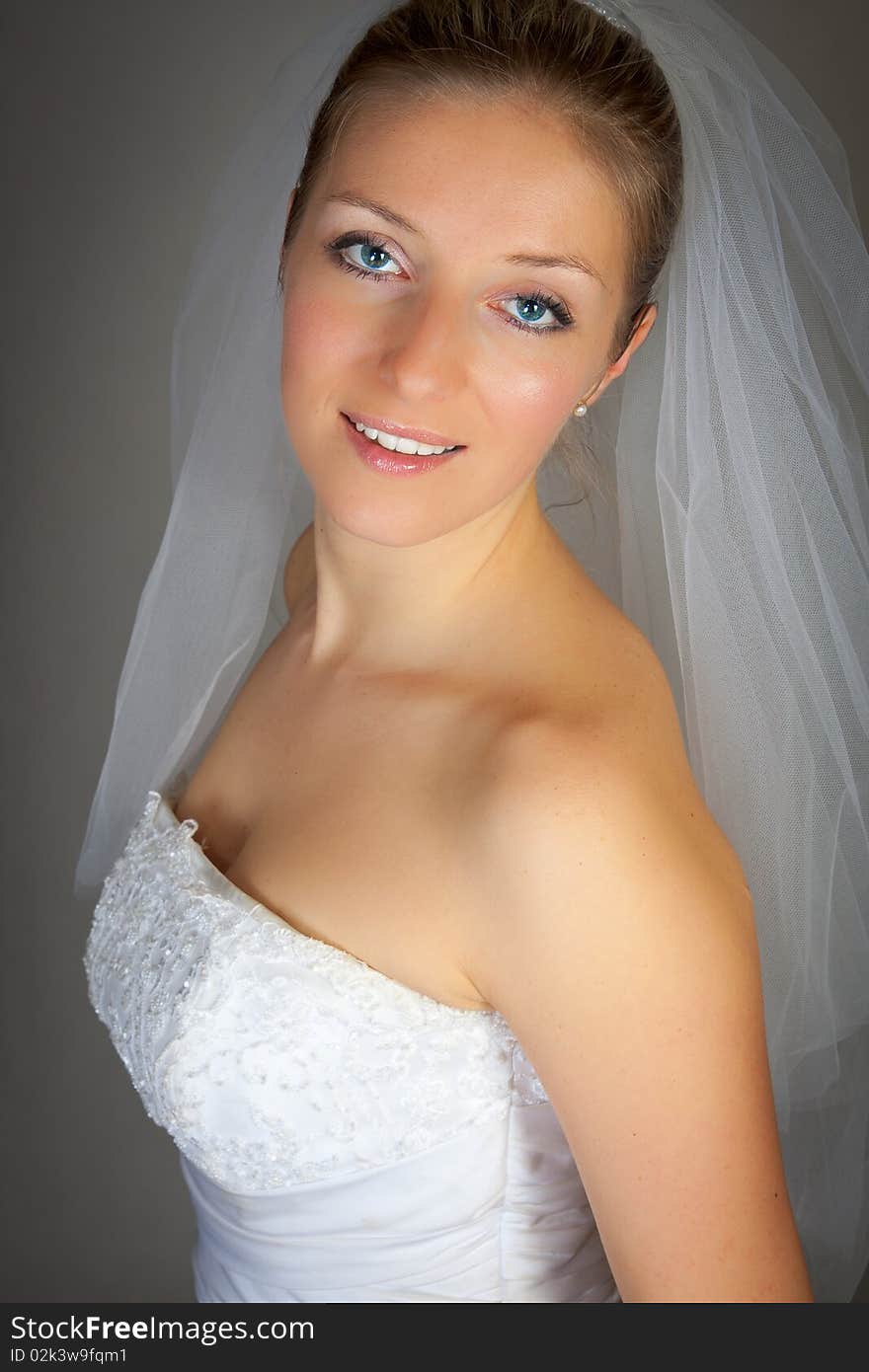 Young woman in wedding dress