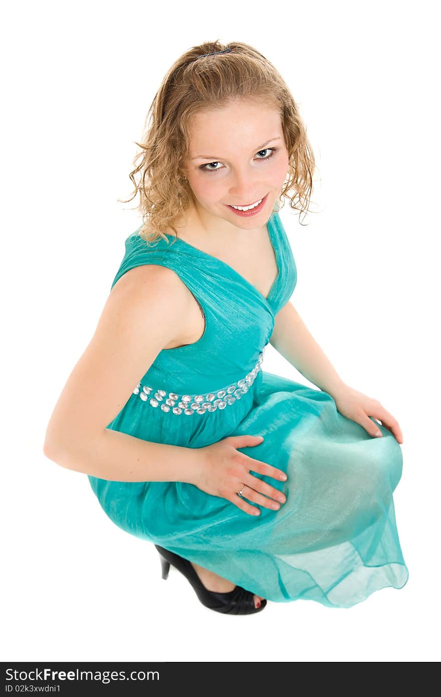 Young caucasian girl in dress on isolated background