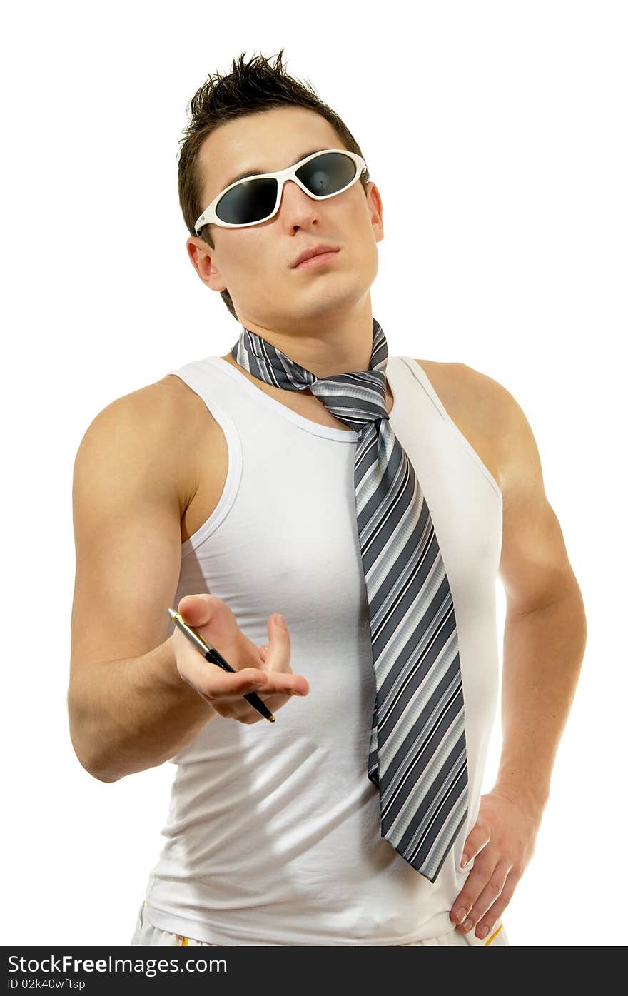 Portrait of attractive muscular man holding pen with tie in sunglasses