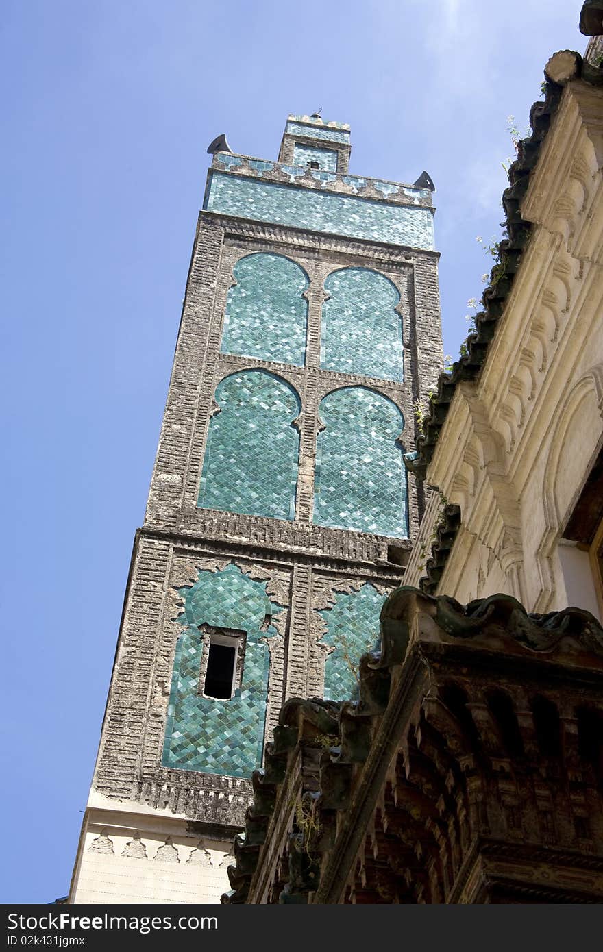 Minaret in fes morocco covered with turquoise tiles. Minaret in fes morocco covered with turquoise tiles