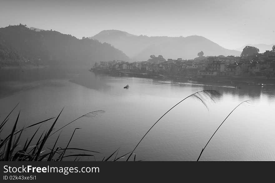 Peace lake scenery and a small village, China. Peace lake scenery and a small village, China